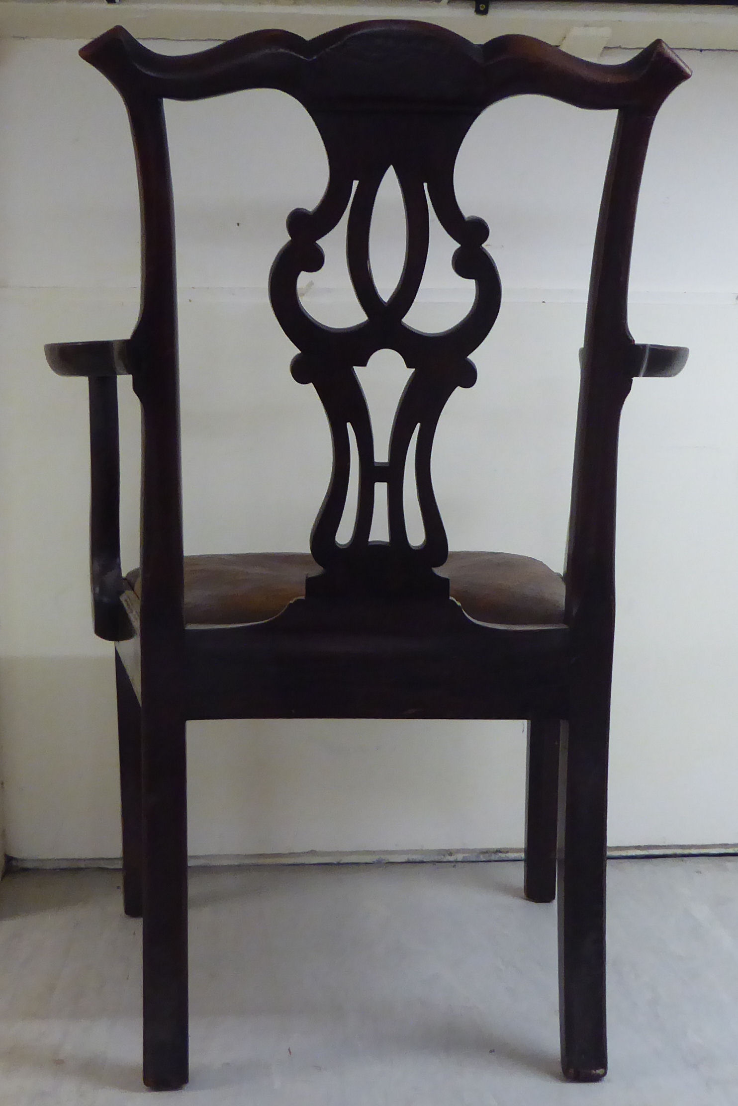 An early 19thC Chippendale inspired mahogany framed elbow chair with a yoke crest, pierced splat, - Image 3 of 4