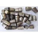 A small uncollated collection of mainly silver thimbles OS10