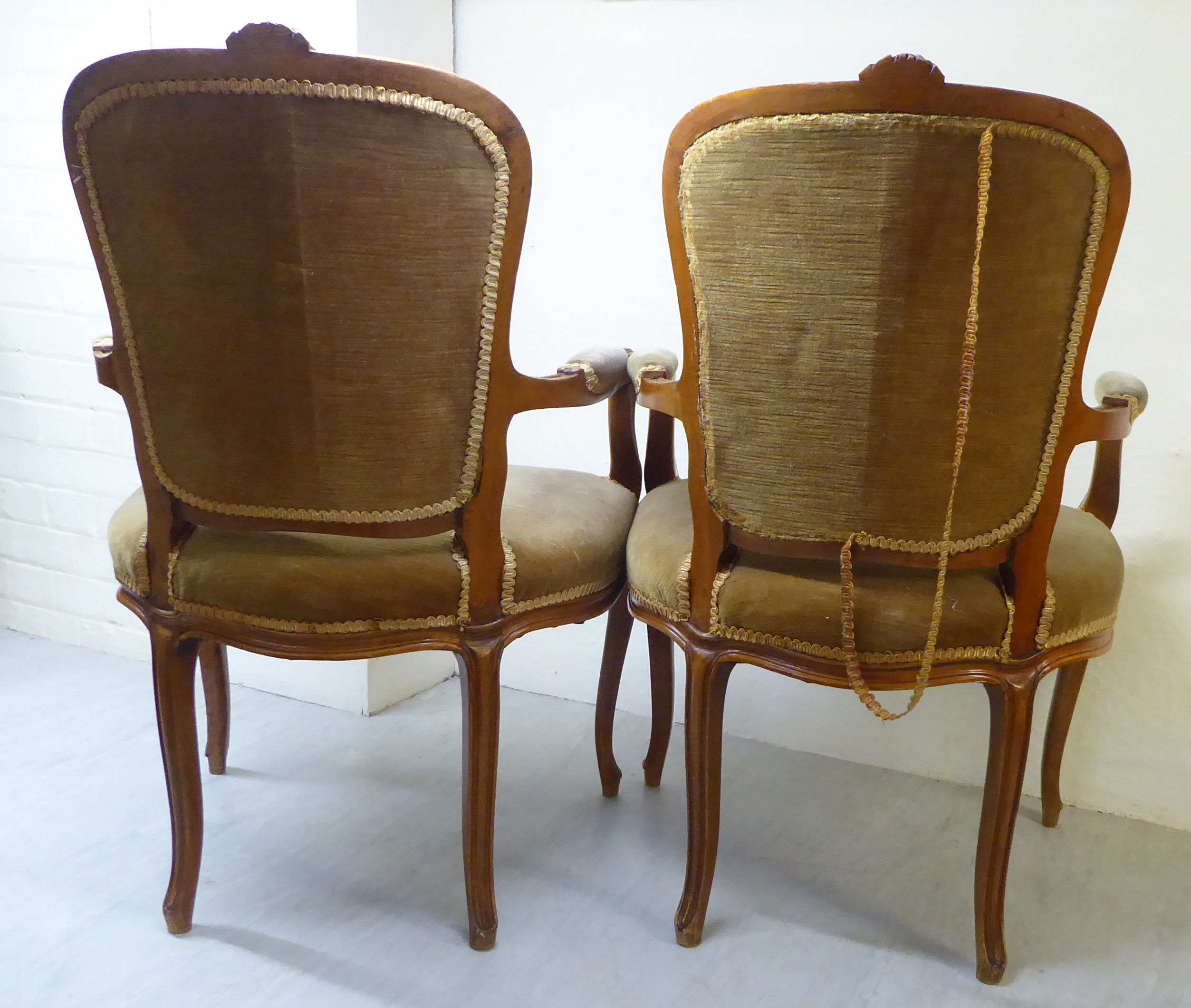 A pair of late 19thC Louis XVI design walnut framed salon chairs, each with a floral carved crest, - Image 2 of 2