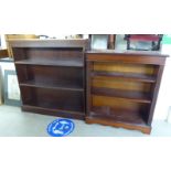 Two similar modern mahogany three tier open front bookcases,