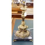 A modern gilded, cast brass table lamp of classical form,