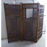 An early 20thC Asian hardwood framed three fold room screen,