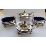 A four piece silver condiments set of oval, ogee form,