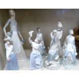 Six Nao and one Spanish porcelain figures: to include a young woman in a nightgown 9.