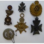 Seven military cast metal badges: to include Royal Fusiliers and Royal Engineers (Please Note: