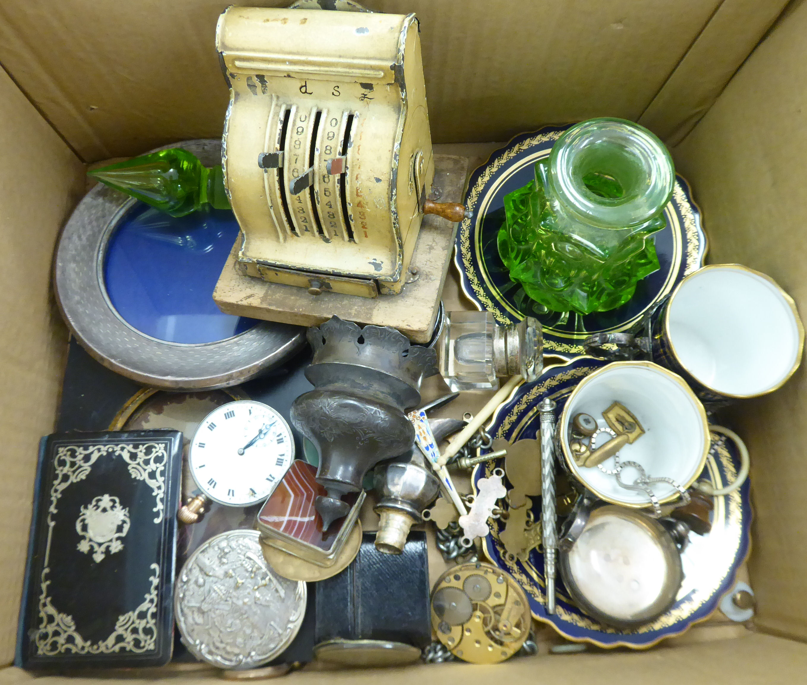 A mixed lot: to include a silver pocket watch case; and a glazed,