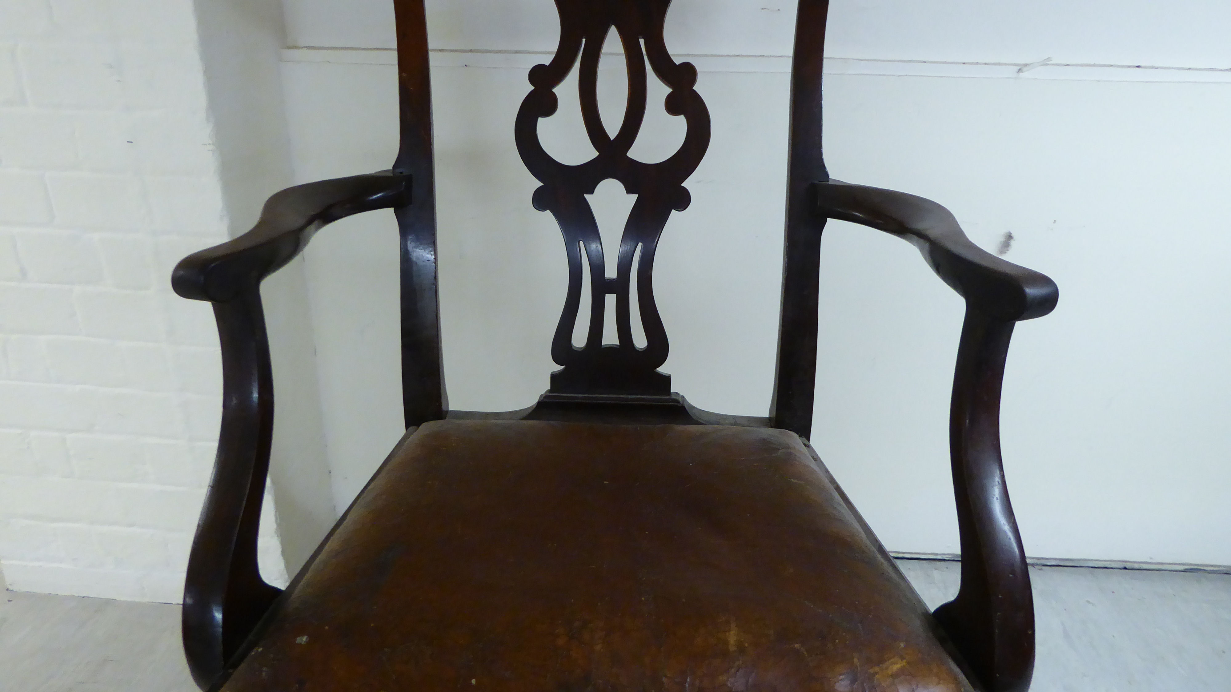 An early 19thC Chippendale inspired mahogany framed elbow chair with a yoke crest, pierced splat, - Image 4 of 4