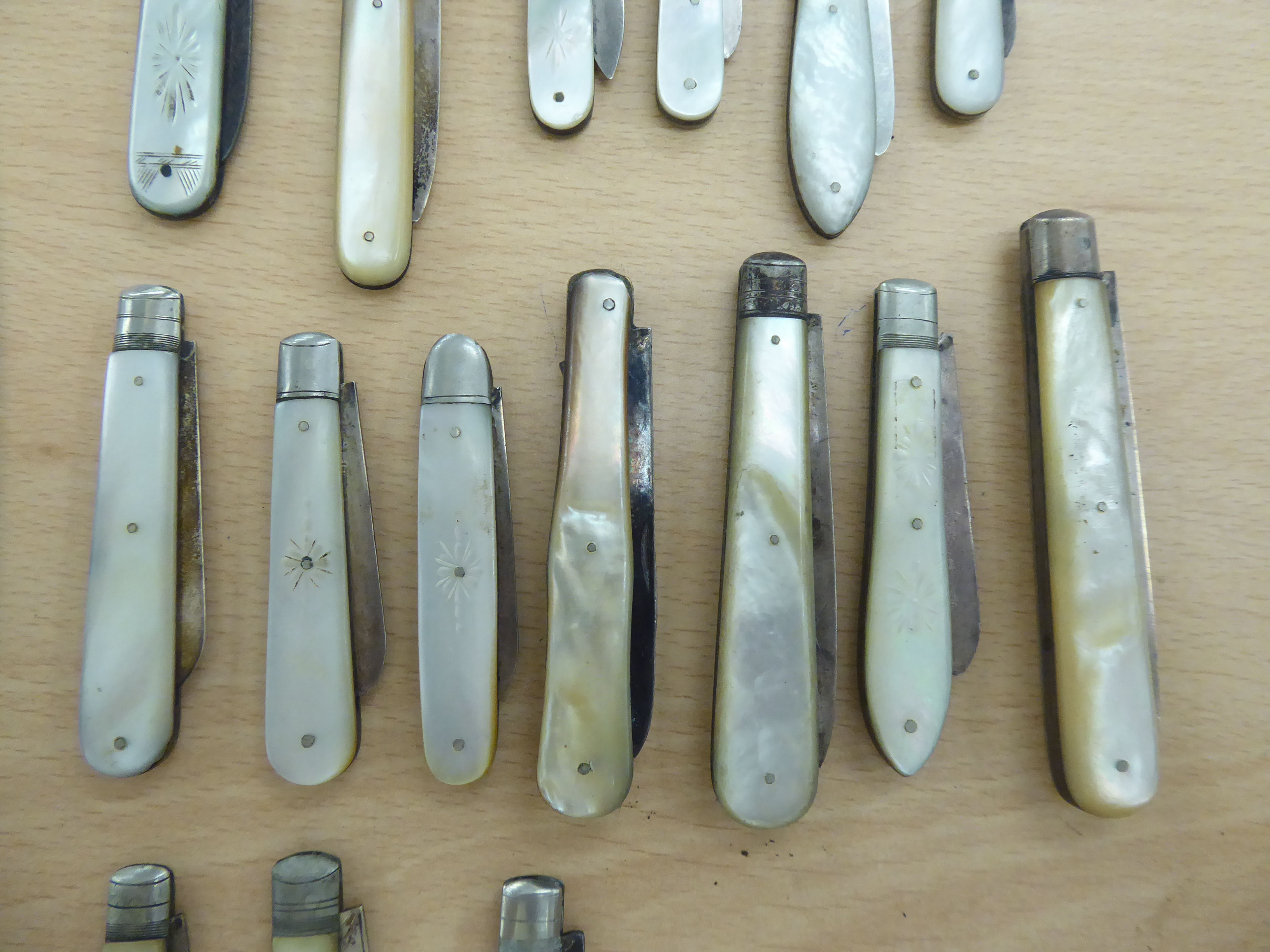 Seventeen similar 19th & 20thC folding fruit knives with mother-of-pearl handles and silver blades - Image 7 of 9