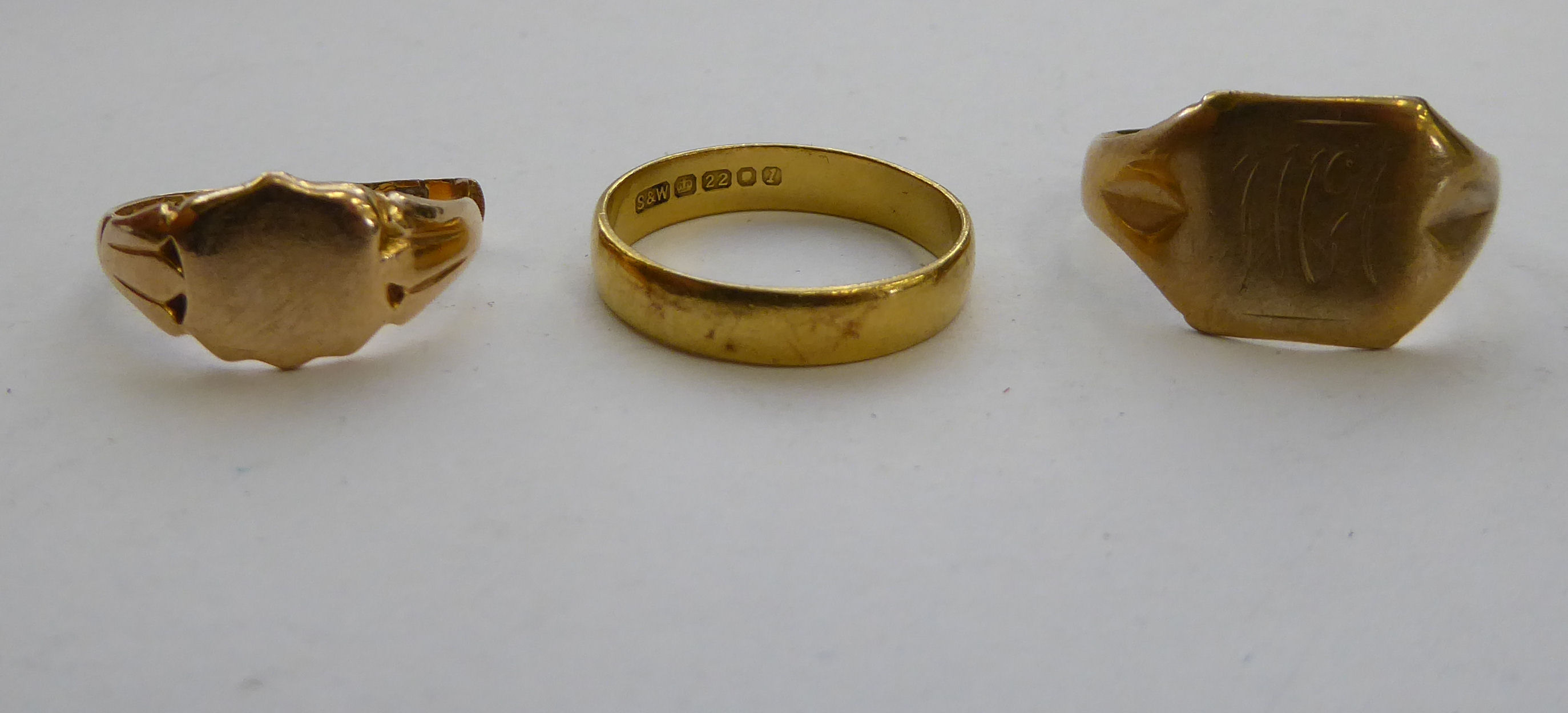 A (broken) 15ct gold signet ring; a (broken) 9ct gold signet ring;