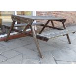 A Swan of Hattersley teak pub garden bench of plank construction 62''w F