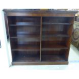 A modern mahogany twin bank, three tier open front bookcase,