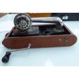 A 1930s Thorens 'Excelda Cameraphone' resembling a folding camera with an iron red painted