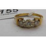 An 18ct gold three stone,