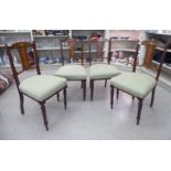 A set of four Edwardian string inlaid mahogany pierced splat back salon chairs,
