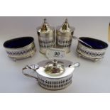 An Edwardian six piece silver condiments set,