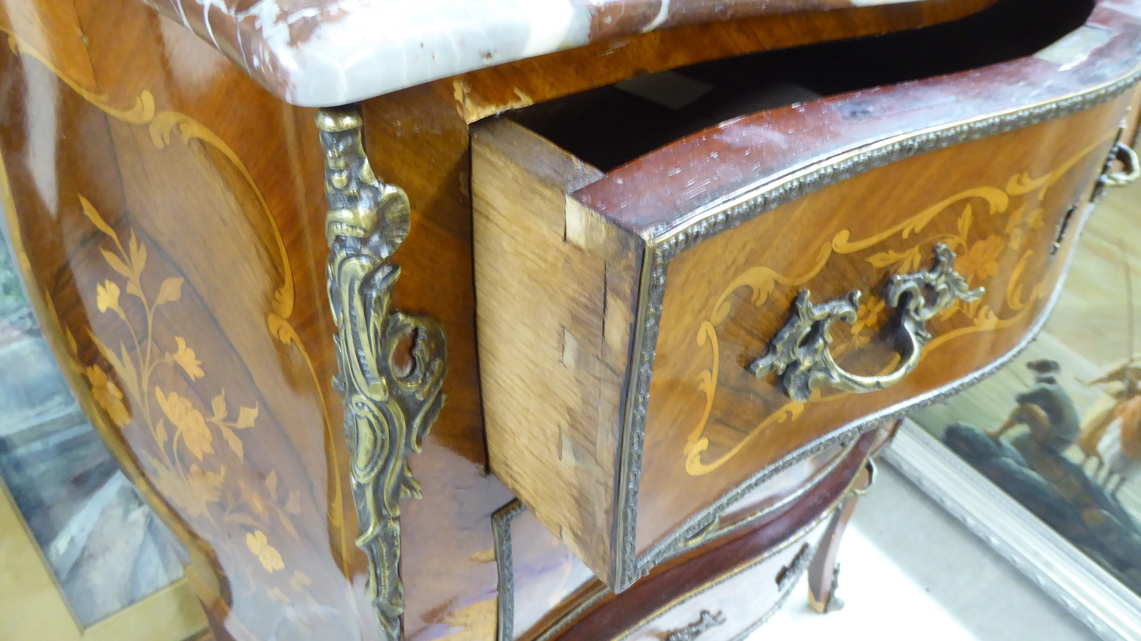 A late 19thC Louis XV design kingwood and marquetry bombe front commode with a mottled marble top, - Image 3 of 3