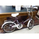 A ladies Stowaway 3 Universal 3 speed folding bicycle with 19''dia wheels CA