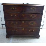 A George III mahogany dressing chest with two short/three long graduated drawers,