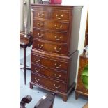 A Bevan Funnell Georgian style, mahogany finished bow front tallboy,