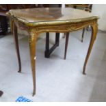 A late 19thC kingwood and marquetry side table with opposing gilt metal handles,