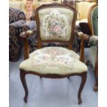 An Edwardian reproduction of a French, showwood framed salon chair,