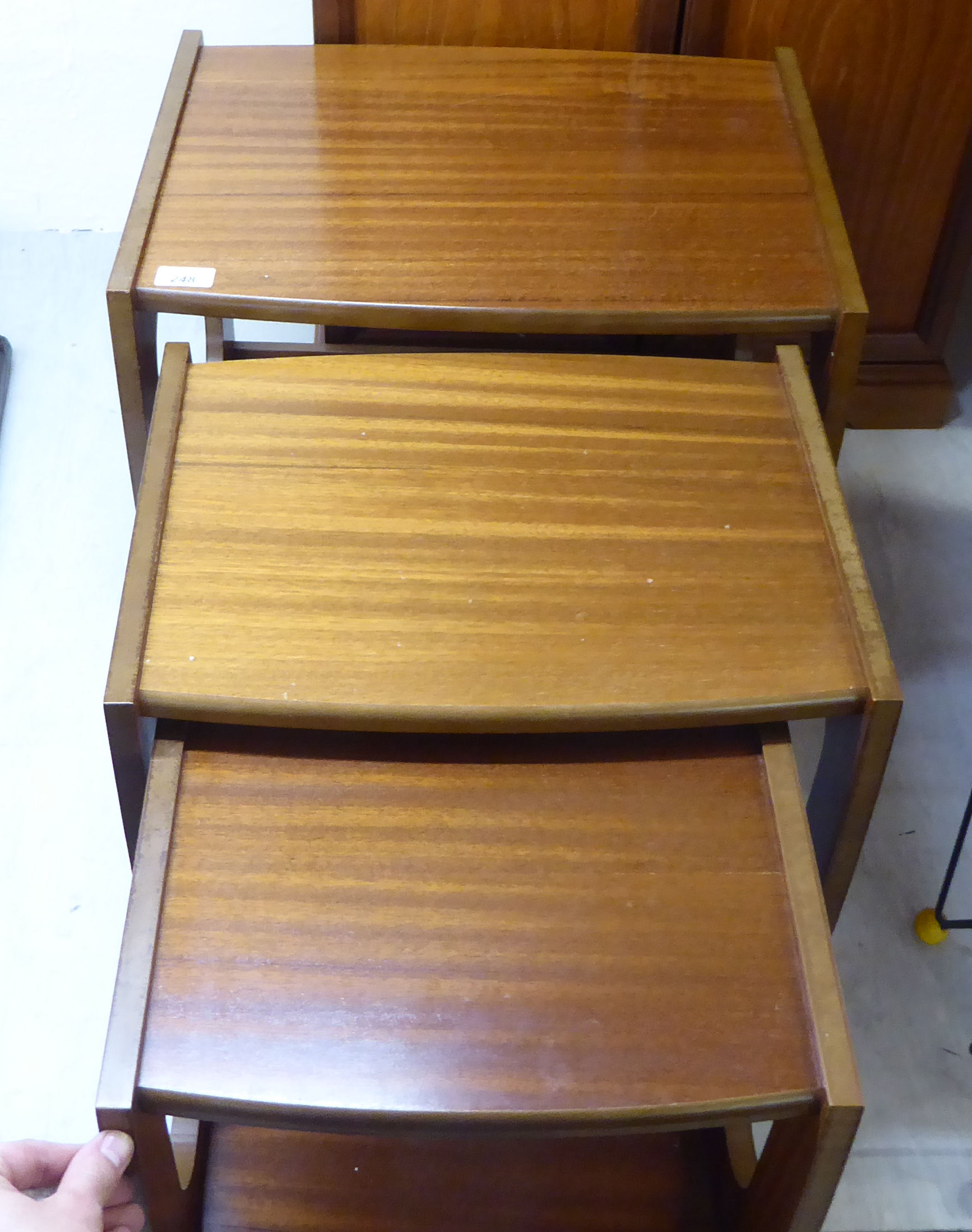 A modern Danish nesting set of three teak occasional tables, raised on cut-out ends largest 16. - Image 3 of 4