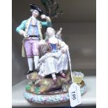 A late 19thC Meissen porcelain group, three figures with baskets of flowers,