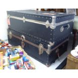 Two similar early/mid 20thC stud and metal bound, canvas covered cabin trunks 11.