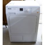 A Miele T Classic condenser tumble dryer 33''h 23.