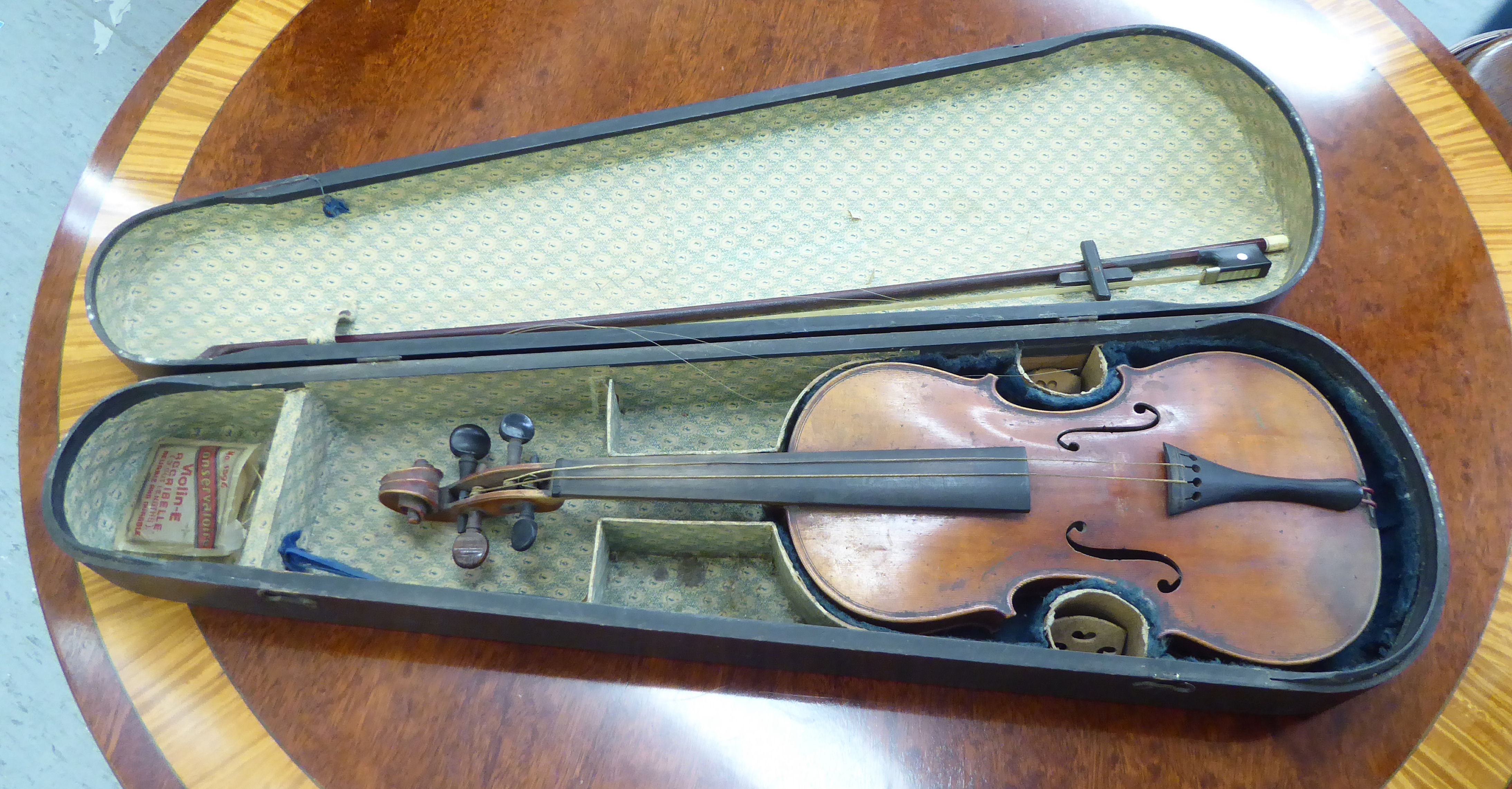 A violin, the two-piece back with a purfled edge 12.