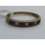 A 9ct gold diamond and sapphire half-eternity ring 11