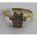 A 14ct gold star design diamond cluster ring 11