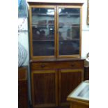 An early Victorian mahogany cabinet bookcase,