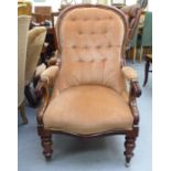 A mid Victorian mahogany showwood framed, balloon back grandfather chair with open arms,