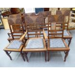 A set of seven early 20thC mahogany framed dining chairs with stylised foliate carved,