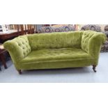 A mid 19thC Chesterfield, button upholstered in sage green dralon,