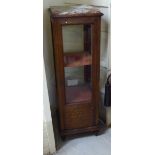 A late 19thC oak and marquetry pedestal display cabinet, the top with a mottled marble panel,
