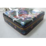 An early 20thC Japanese cloisonne, shallow box and cover, decorated in colours with fan ornament,