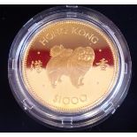 An Elizabeth II Hong Kong gold proof 1000 dollars Lunar Year Coin (The Year of the Dog) 1982