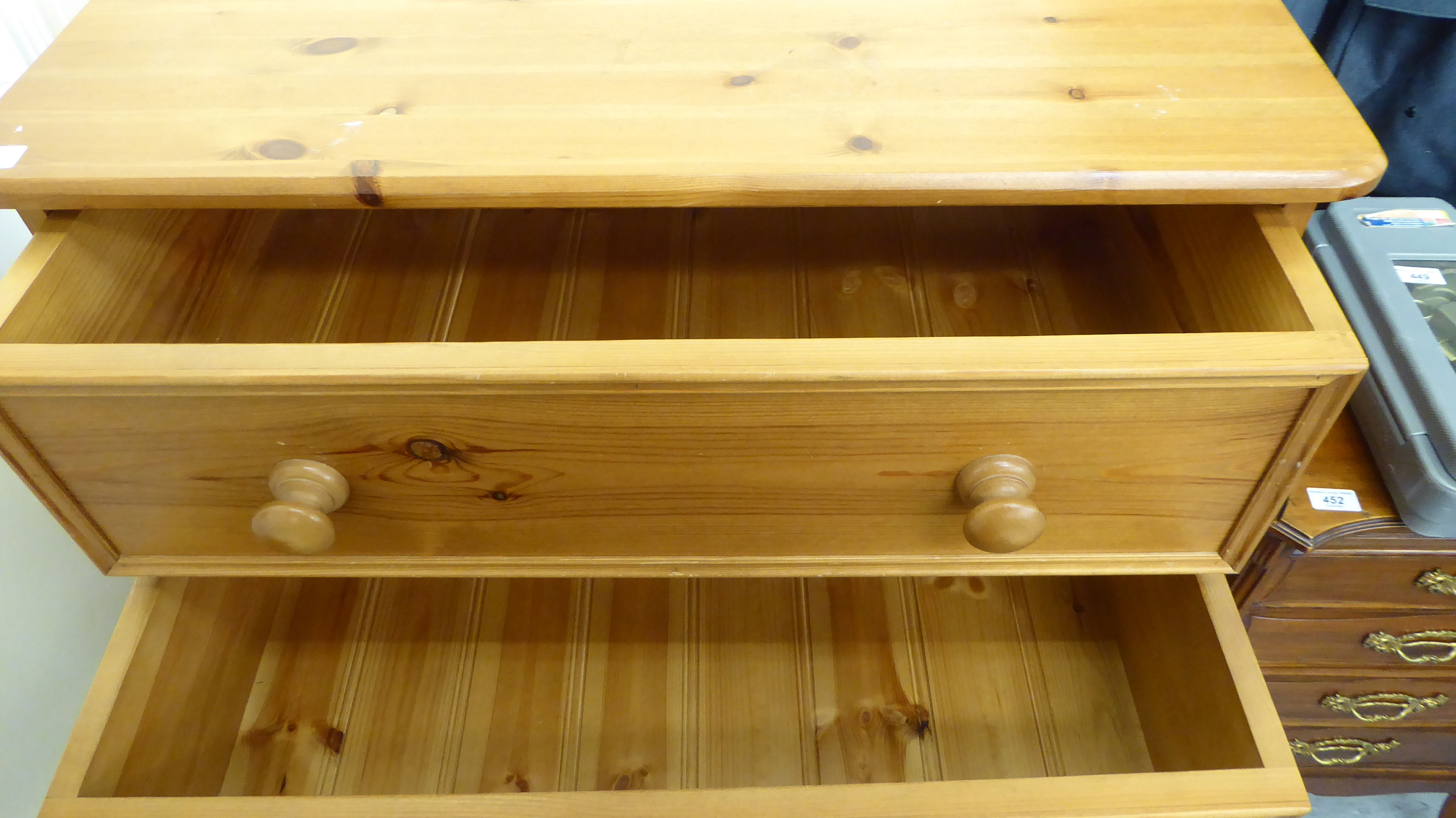A modern honey coloured pine, five drawer tallboy, - Image 2 of 2