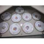 A matched set of nine mid 19thC Meissen porcelain plates, decorated with flora 9.