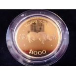 An Elizabeth II Hong Kong gold proof 1000 dollars Lunar Year Coin (The Year of the Pig) 1983