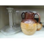 Three early 20thC Royal Doulton stoneware harvest jugs 5.5''-8.