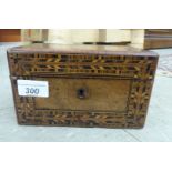 An early 19thC figured walnut casket with decoratively inlaid borders,