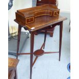 An Edwardian mahogany lady's desk with crossbanded satinwood ornament, a low,