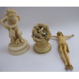 Late 19thC carved ivory ornaments: to include a cherub, holding a pair of bellows 3.