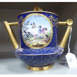 An early Victorian porcelain teapot of cylindrical form,