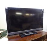 A Sony Bravia 38'' television with remote control BSR