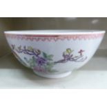 A 20thC Chinese porcelain footed bowl, decorated with exotic birds,