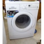 A Siemens IQ300 washing machine 33''h 23.